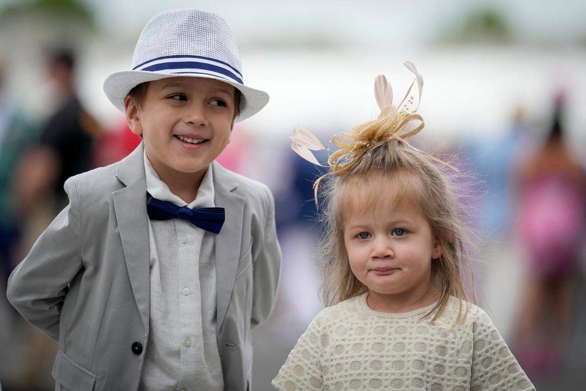 Children wait in line for their seats on the day of the 149th running of the Kentucky Derby at Churchill Downs Wednesday, May 3, 2023, in Louisville, Ky. (For the Herald Leader/Bryan Woolston)