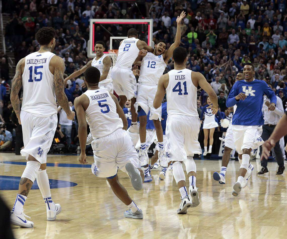 Kentucky players celebrated after defeating Notre Dame to remain undefeated and advance to the 2015 Final Four.