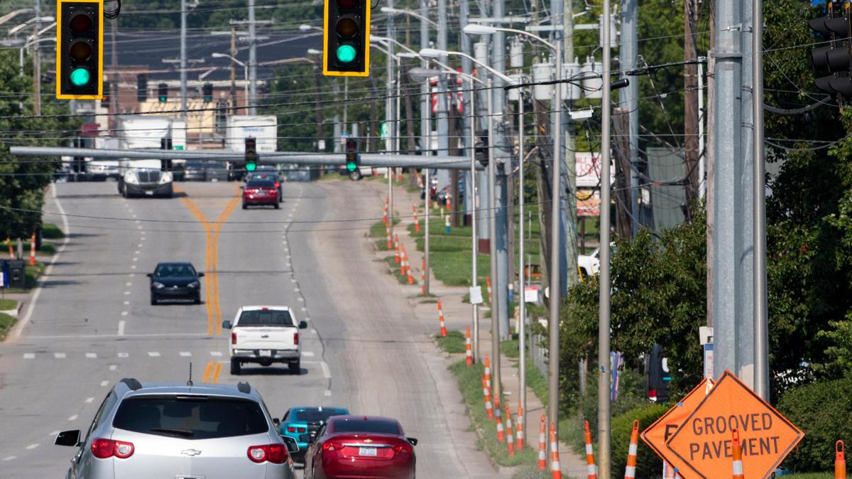 Signs for repaving work on Versailles Road between Oxford Circle to Angliana Avenue in Lexington, Ky., Monday, July 19, 2021. According to the Kentucky Transportation Cabinet work will start in the evenings at seven and stop at seven in the morning. The anticipated completion date for the project is Monday, November 15.