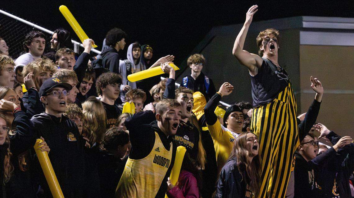 Yellow Jackets student section showing school spirit during the Class 5A Region Championship game between Scott County and Woodford County on Nov. 21, 2025, at the Community Stadium at Falling Springs Center in Versailles, Ky.