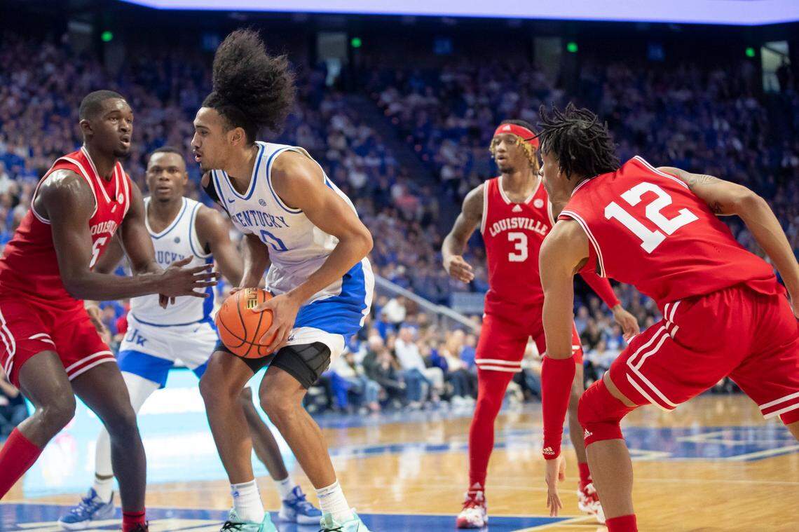 Kentucky forward Jacob Toppin (0) looks to move the ball against Louisville Cardinals at Rupp Arena on Saturday.