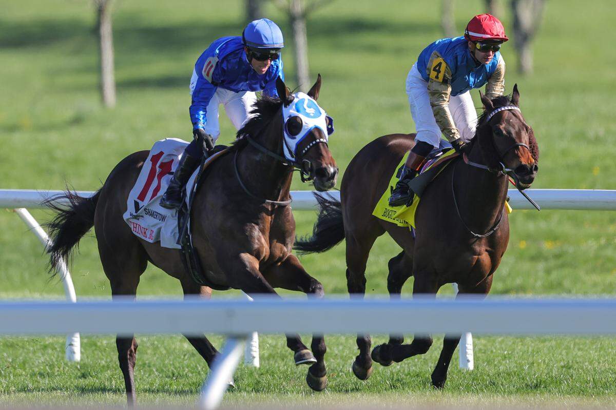 Think Big, at left with Ben Curtis up, wins the Grade 2, $400,000 Shakertown on Tuesday.