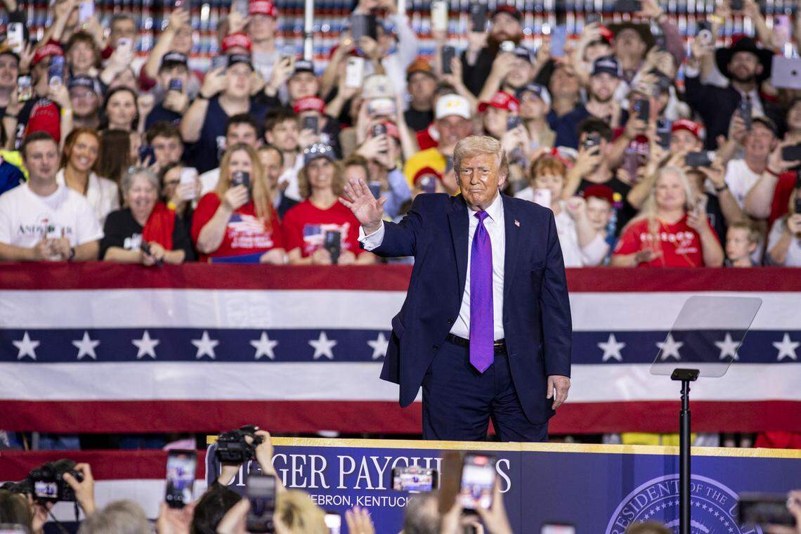 President Donald Trump waves goodbye to the crowd during his visit to Verst Logistics in Hebron, Kentucky, on Wednesday, March 11, 2026.