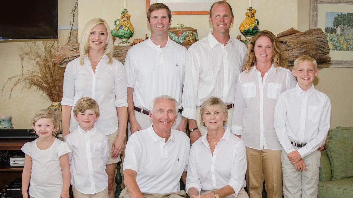 The Beshear family 2014 Christmas card shows, from left to right on the front row, Lila, Will, Steve and Jane. On the back row,from left to right, are Britainy, Andy, Jeff, Emily and Nicholas.
