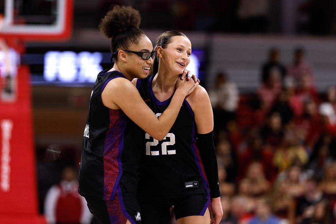 Former Kentucky Wildcats guard Maddie Scherr, (22) was hugged by TCU teammate Olivia Miles (5) late in the then-No. 17 Horned Frogs’ 69-59 road upset of then-No. 10 North Carolina State on Sunday. Scherr and another ex-Cat, center Clara Silva, start for a TCU team with Final Four aspirations.