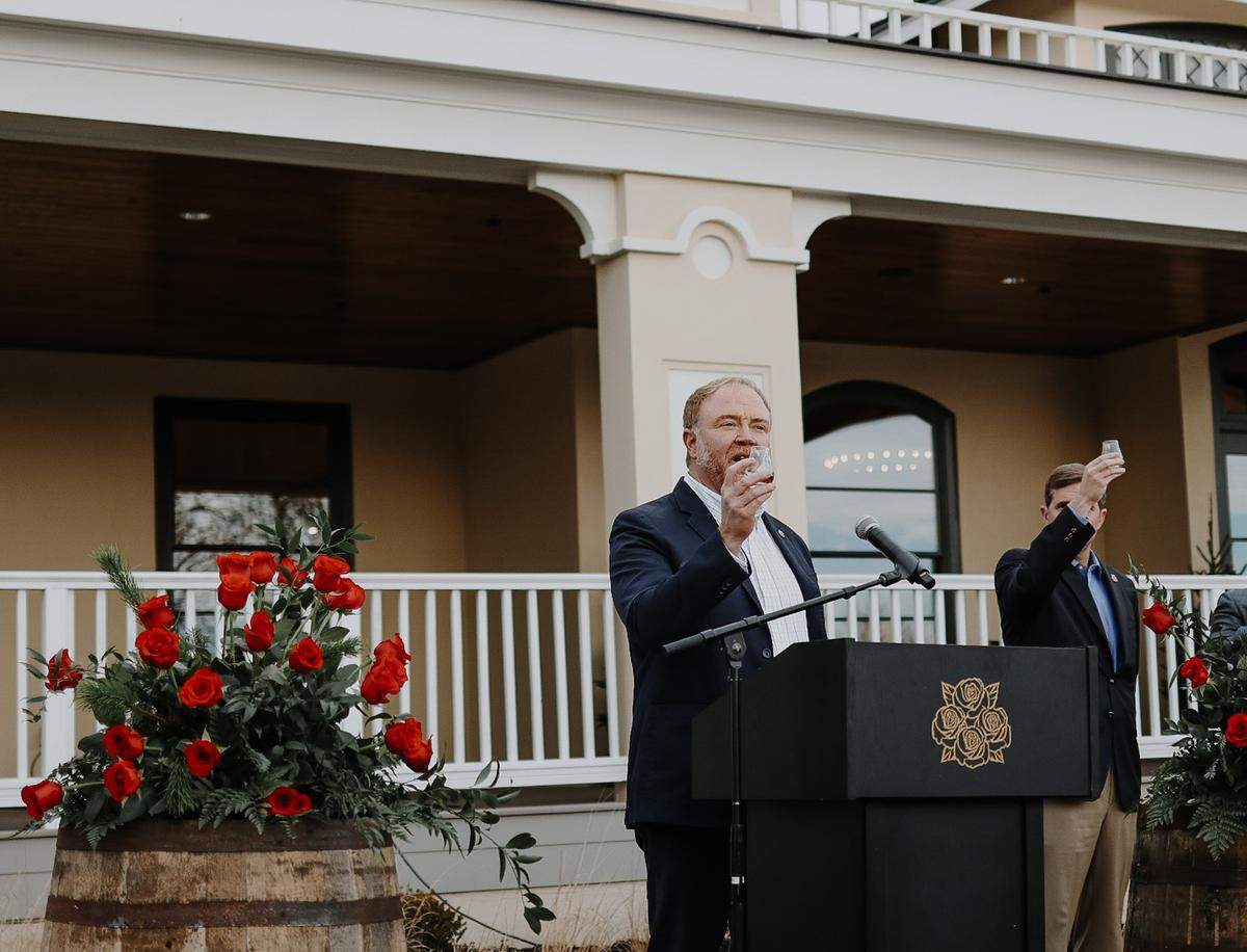 Four Roses master distiller Brent Elliott, with Gov. Andy Beshear, toasted the opening of the new visitors center at the Lawrenceburg distillery in 2021.