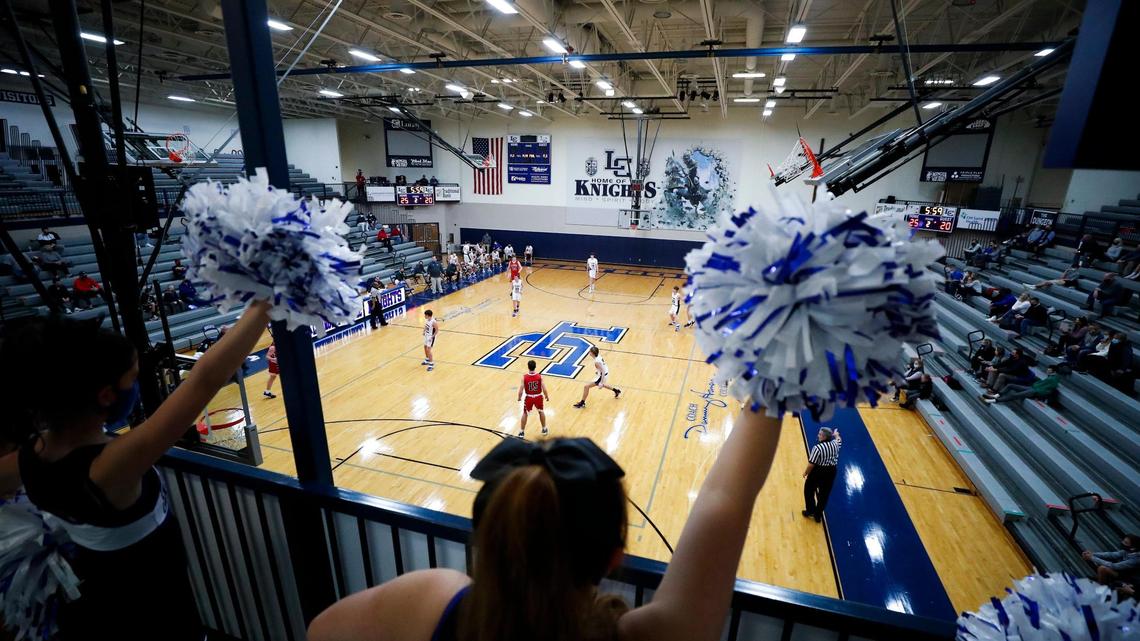 Lexington Catholic cheerleaders overlook a game between St. Henry and Lexington Catholic at Lexington Catholic High School on Jan. 7, 2021. Lexington Catholic has canceled a number of upcoming games as it observes a COVID-19 isolation period.