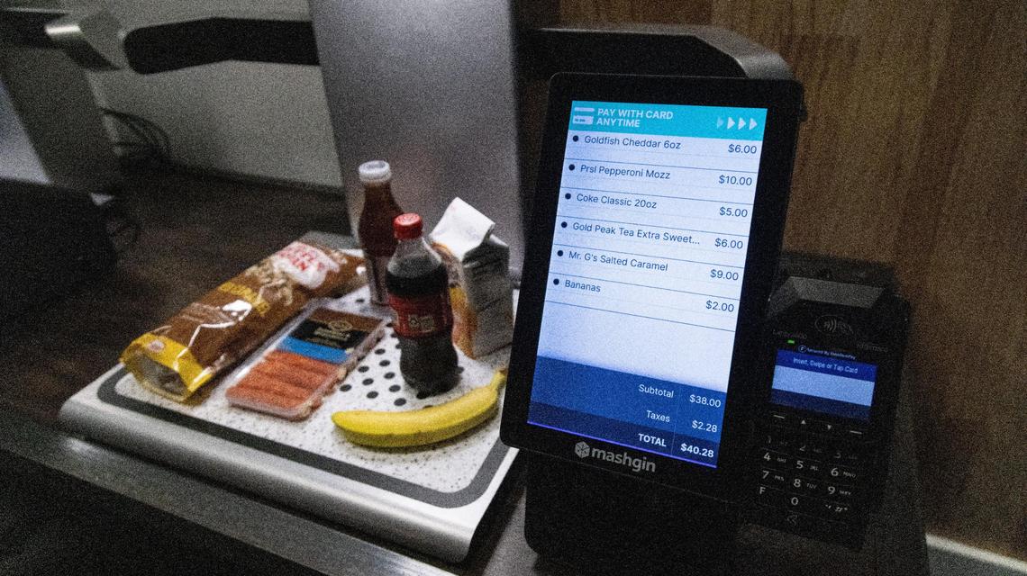 Self-checkout kiosks at the new Kroger Corner grab-and-go snack shop within Rupp Arena automatically detects each item placed on the platform.