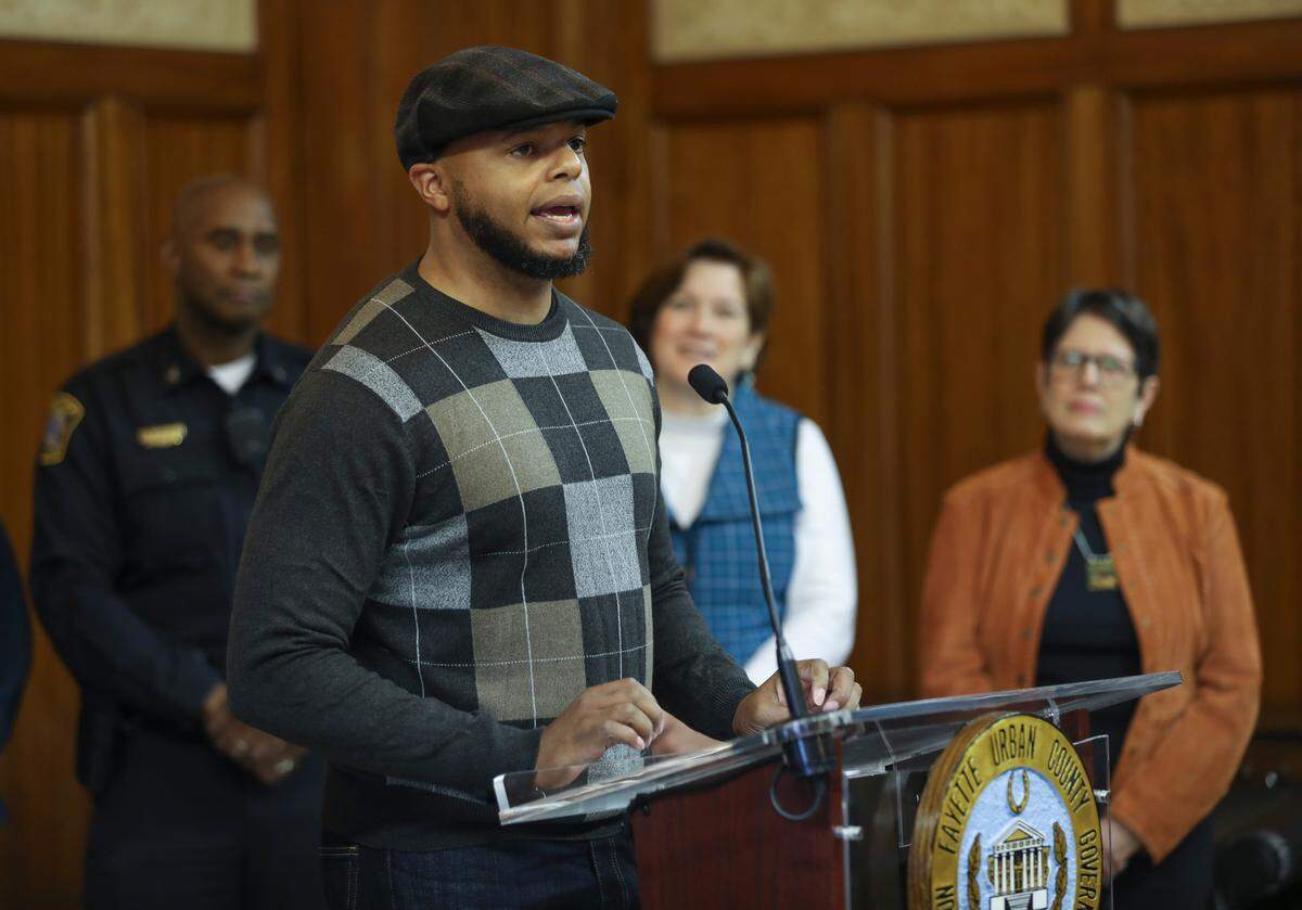 Devine Carama, a hip hop artist and local activist, joins Mayor Linda Gorton to announce a partnership between her office and the Preventum Initiative to implement “Full Energy, No Drugs”-- FEND -- an app-based opioid education and prevention campaign for teenagers during a press conference Jan. 6, 2020.