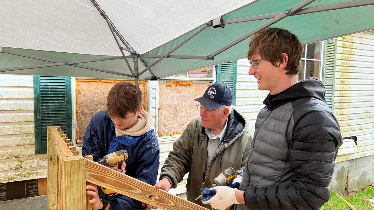 Guy Adams works with college students at a past WorkFest.