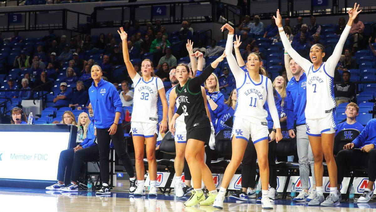 The Kentucky bench watches as Gabby Brooks (11) shoots a 3-pointer in the team’s season opener against USC Upstate.