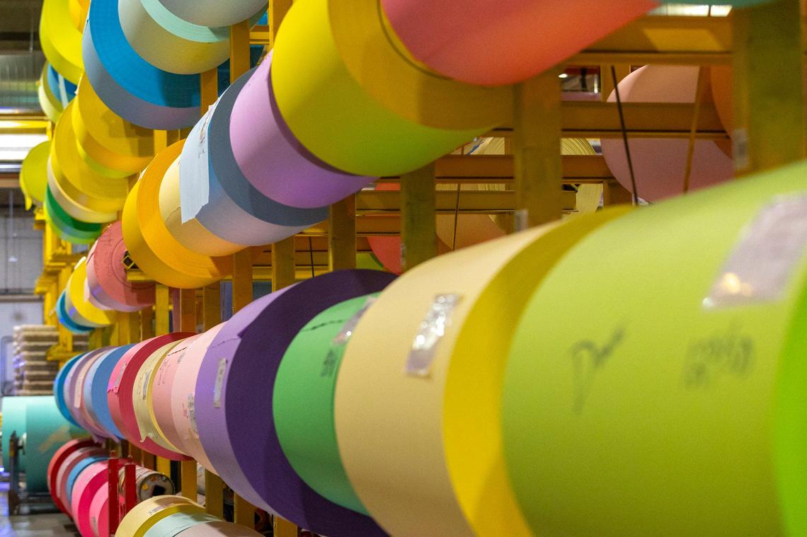 Rolls of color paper wait to be processed into Post-it notes at a 3M facility in Cythiana, Ky., on Tuesday, Sept. 24, 2024.