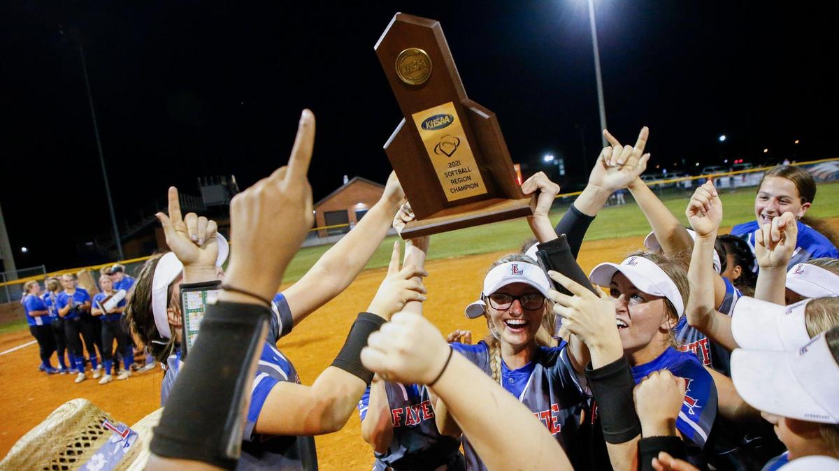 Lafayette celebrates after defeating Lexington Catholic 2-0 in the 11th Region softball tournament championship at Madison Southern High School in Berea on June 8, 2021.