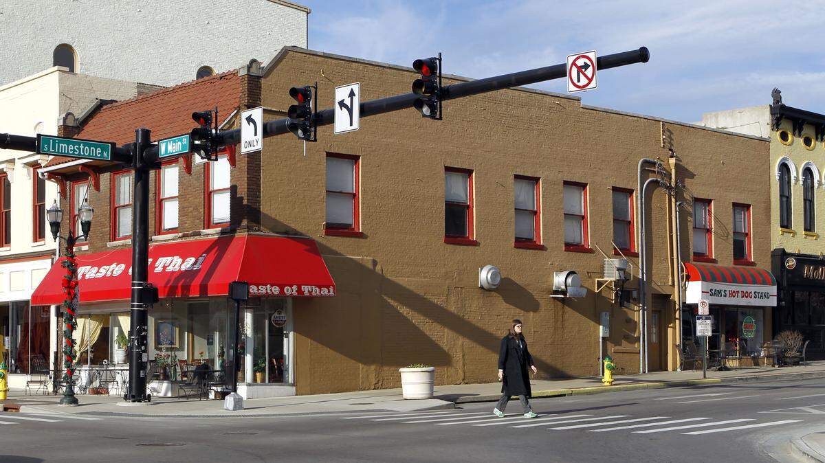 The building at the corner of West Main Street and North Limestone has been purchased by Dudley Webb. The building houses Taste of Thai and Sam's Hot Dog Stand.   