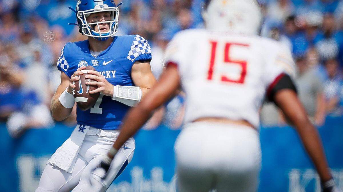 Kentucky Wildcats quarterback Will Levis (7) drops back to pass the ball over Louisiana Monroe Warhawks safety Austin Hawley (15) during a game at Kroger Field in Lexington, Ky., Saturday, Sept. 4, 2021.
