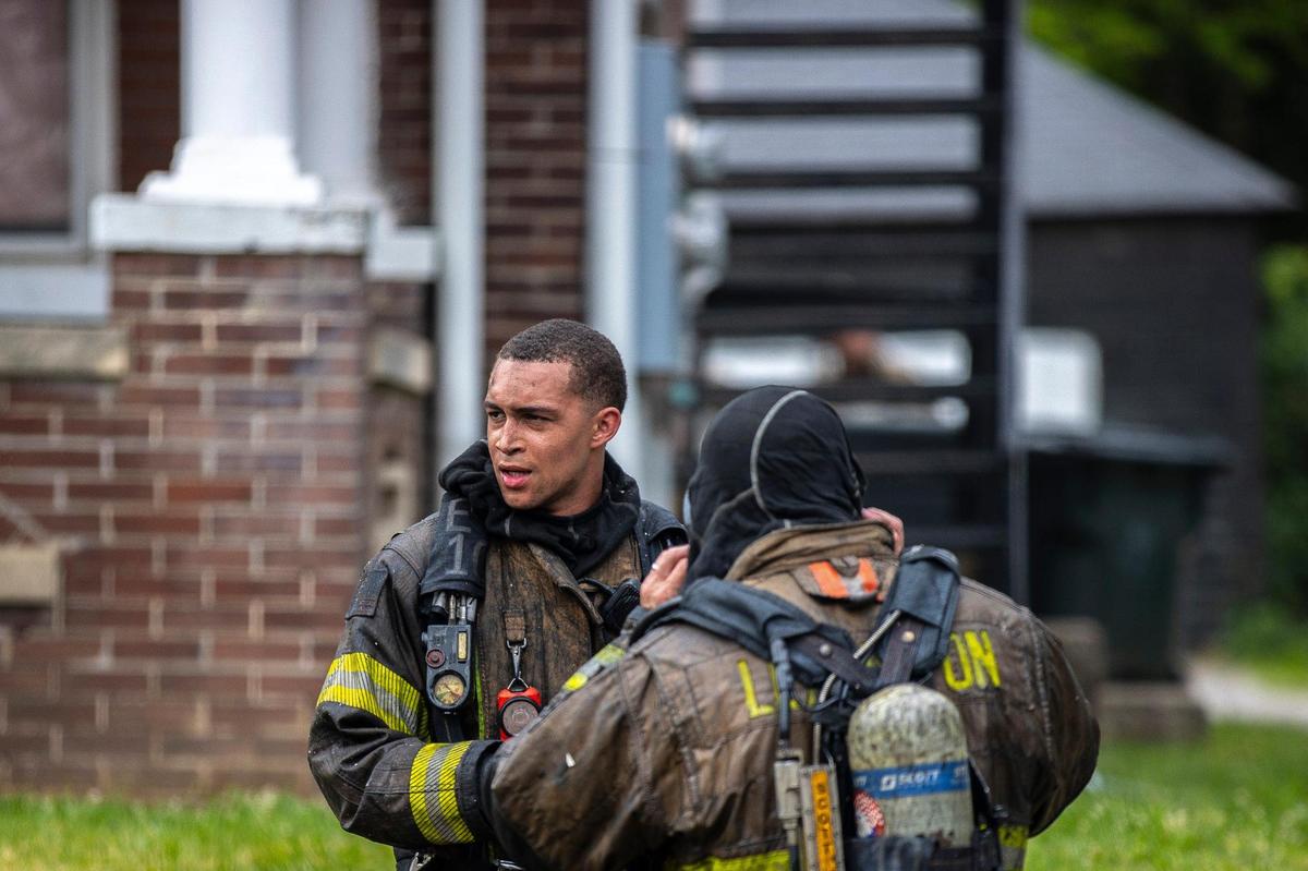 Members of the Lexington Fire Department respond to a structure fire on Aylesford Place in Lexington, Ky., on Monday, June 20, 2022.