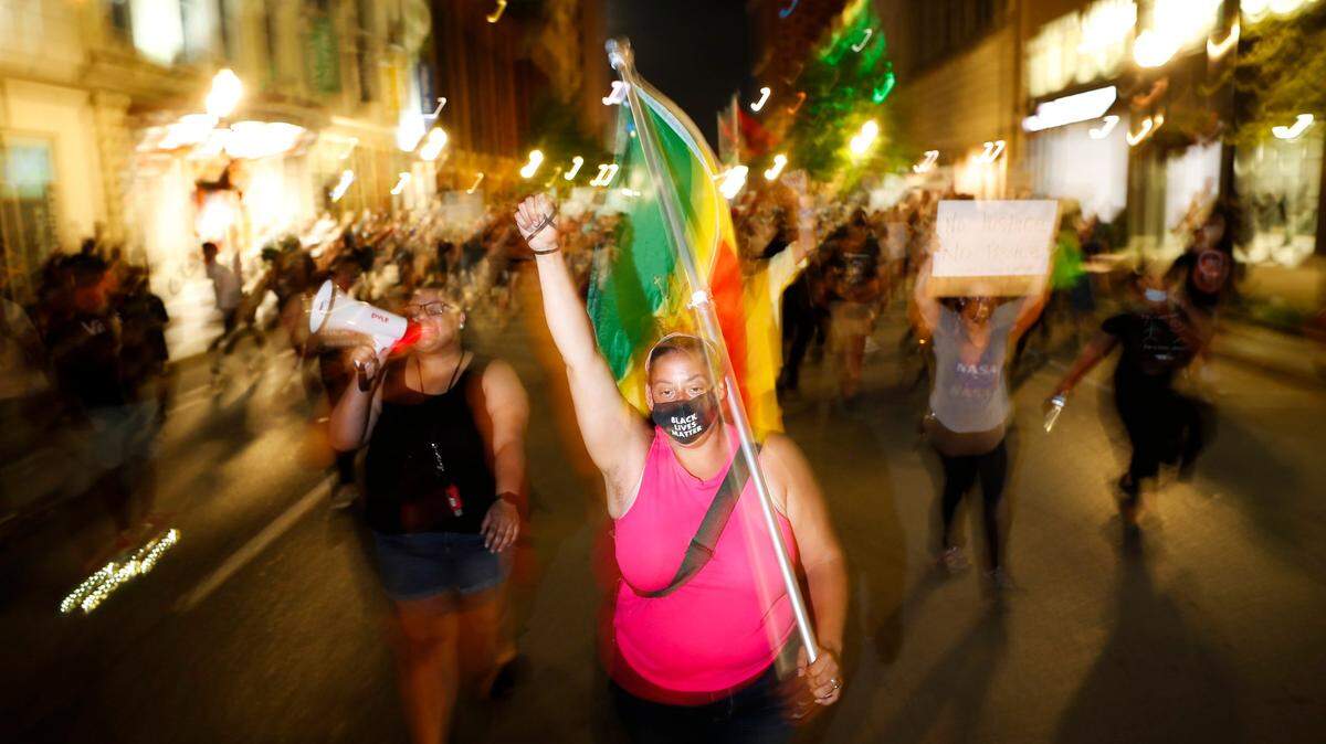 Sarah Williams led demonstrators down East Main Street during protests in downtown Lexington, Ky., Friday, June 5, 2020.