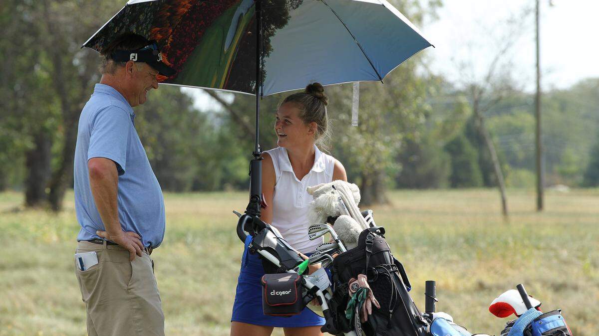 Lexington Christian’s Laney Frye chatted with her LCA coach and dad B Frye before teeing off on 18 last week during the 9th Region championship at Keene Run in Nicholasville. This year is Laney’s senior season and her dad’s last year as coach of the LCA girls’ team.