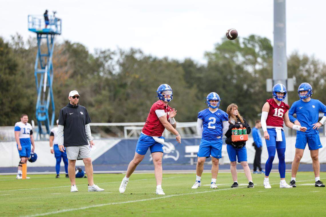 Offensive coordinator Liam Coen watches quarterback Devin Leary during Kentucky’s practice in Jacksonville, Florida, on Wednesday ahead of Friday’s Gator Bowl game vs. Clemson.