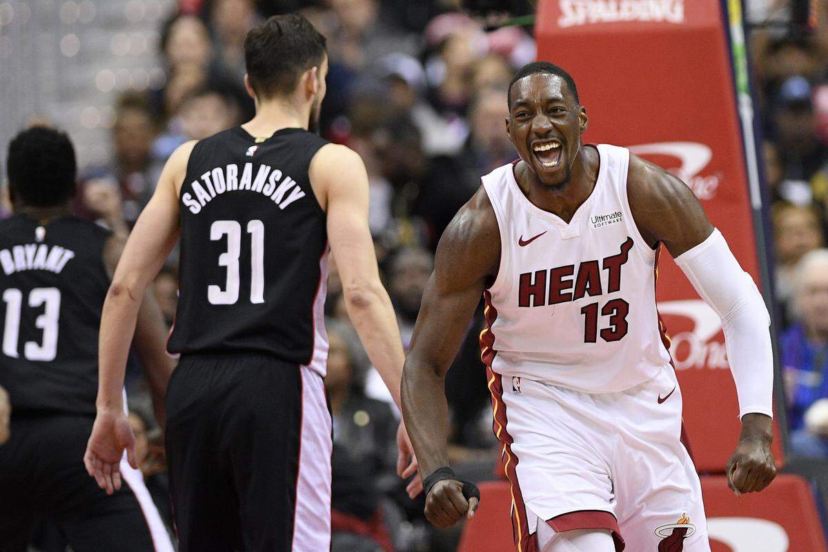 Miami Heat center Bam Adebayo (13) is averaging career highs in points (13.9), rebounds (10.3), assists (4.0), steals (1.4) and blocks (1.2) in this, his third, NBA season.