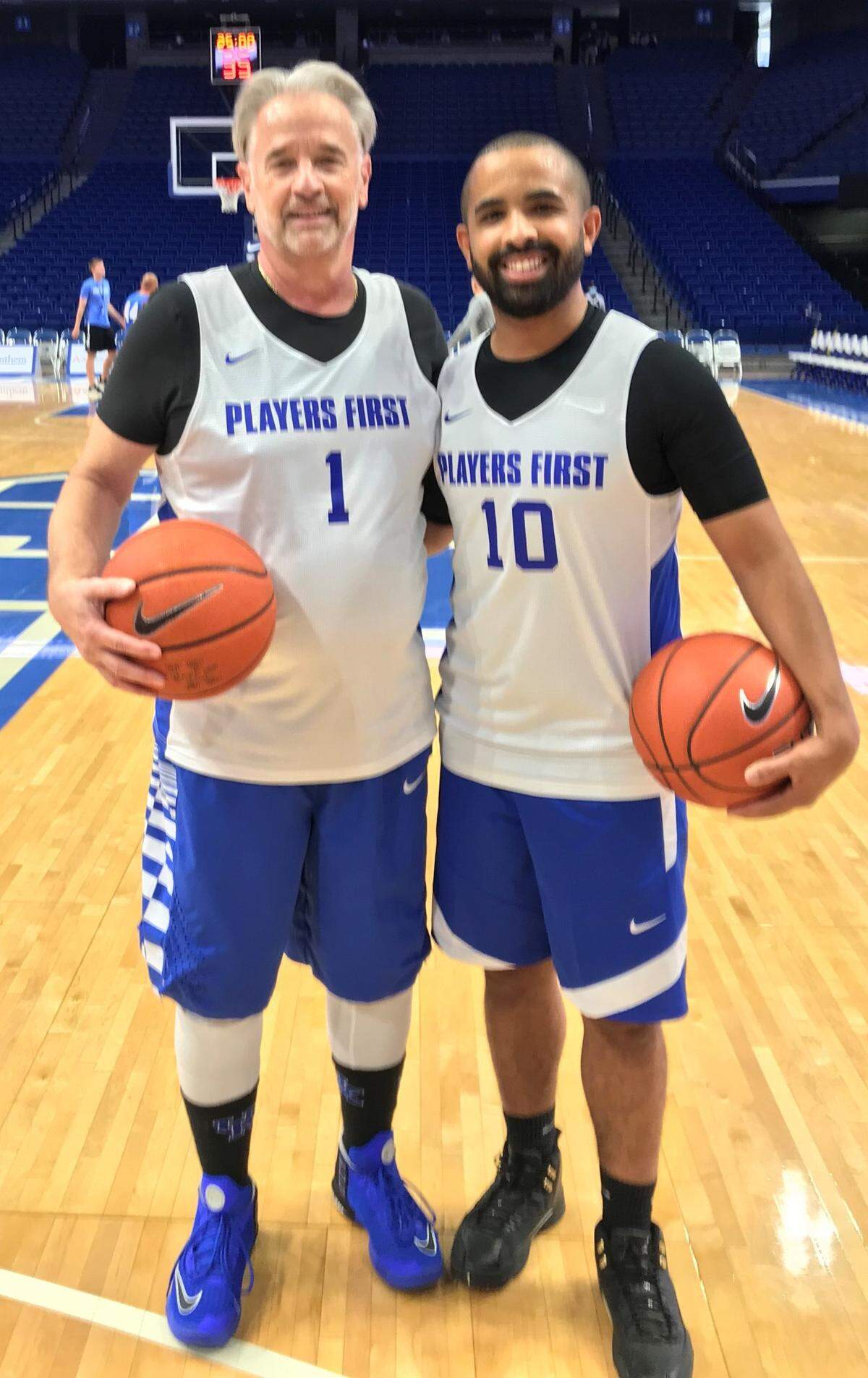 Dan Doepke, left, and Marcus Kelly took part in a basketball fantasy camp at Rupp Arena on Friday.