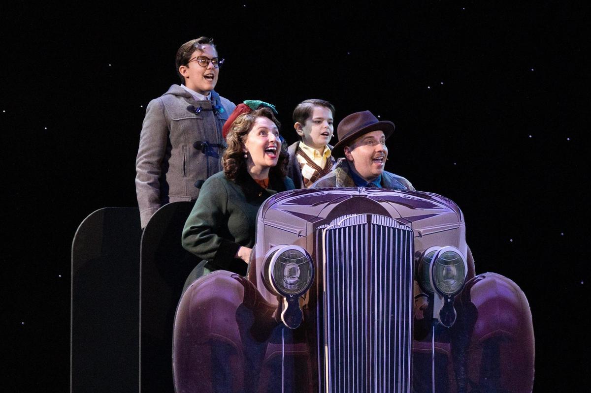Ralphie and his family sing during rehearsals of The Lexington Theatre Company’s rendition of “A Christmas Story,” at The Lexington Opera House, November 18, 2024. The theatre group is having six performances this weekend.
