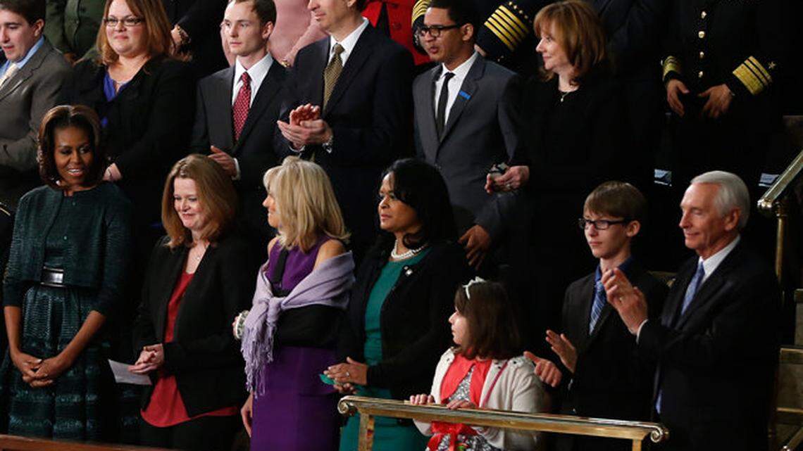 President Obama lauded Kentucky Gov. Steve Beshear, right, during the State of the Union address for efforts to enroll ­Kentuckians in health care plans.