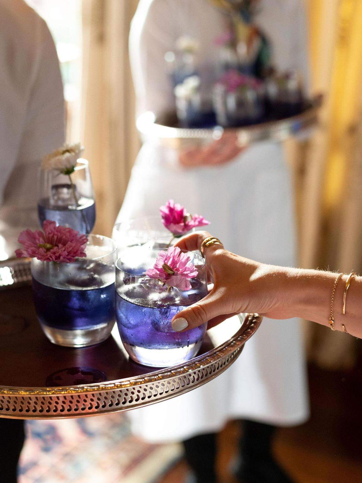 A previous dinner at Apiary featured an Alice & Wonderland theme with flower-garnished drinks.
