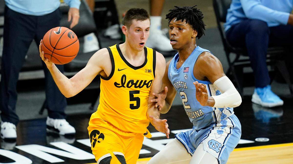 The decision of ex-Covington Catholic star CJ Fredrick (5) to transfer to Kentucky from Iowa has drawn the ire of some Hawkeyes fans.