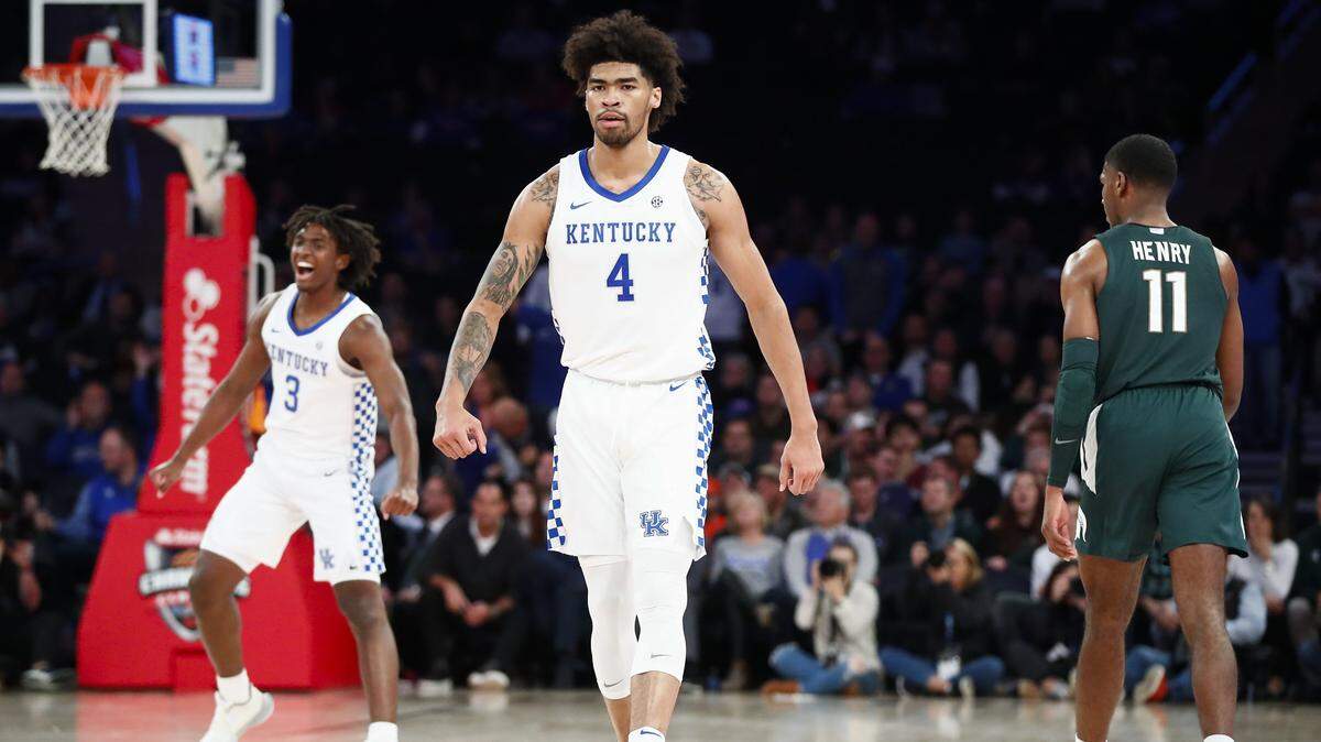 Tyrese Maxey (3) and Nick Richards (4) were both major contributors to No. 2 Kentucky’s win over No. 1 Michigan State in Madison Square Garden. Maxey led all scorers with 26 points. Richards, who played the role of interior disruptor on defense, finished with seven points and four rebounds.