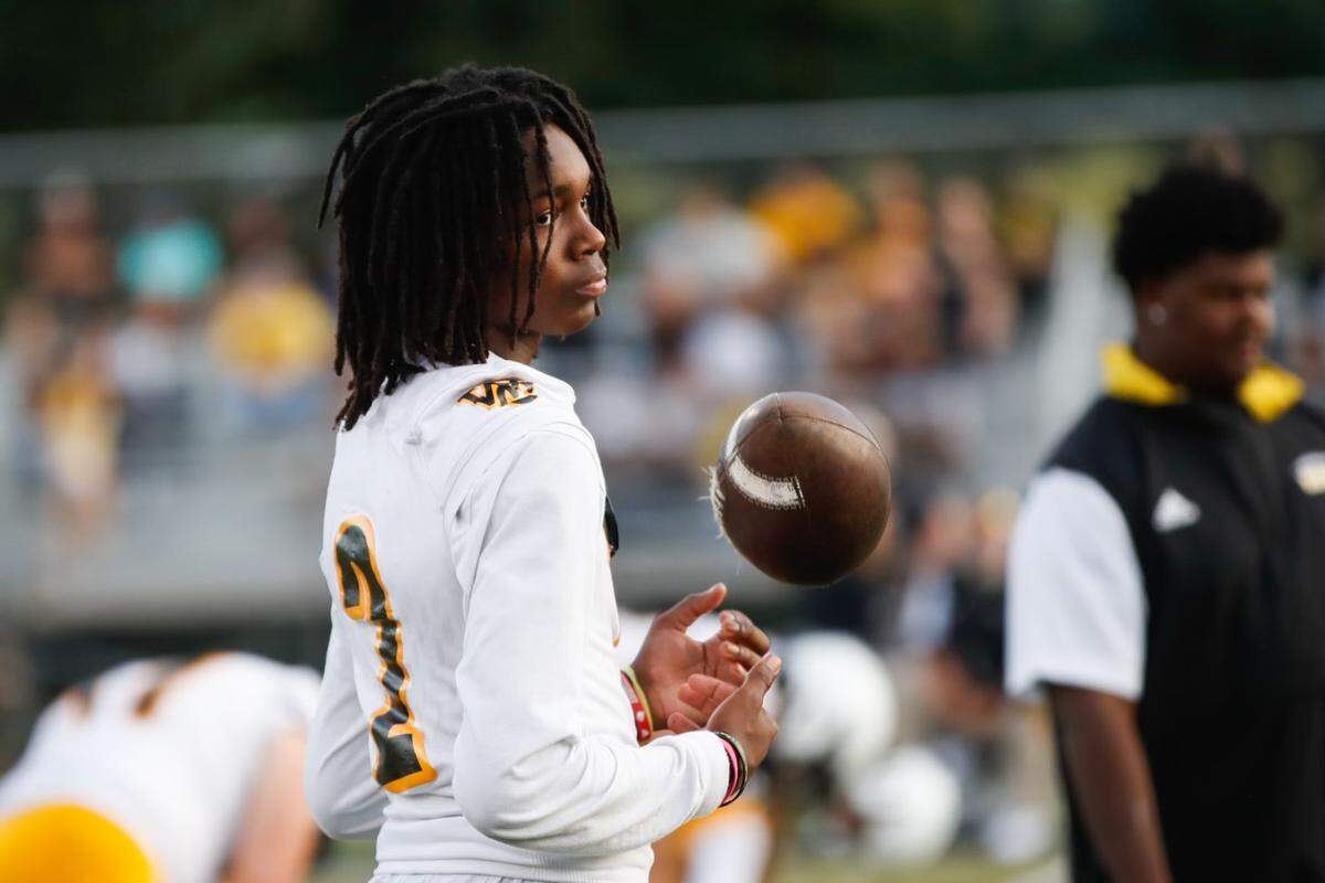 Woodford County sophomore Jasper Johnson, shown here at a Yellow Jackets football game, is one of the highest-ranked basketball recruits in the class of 2025.