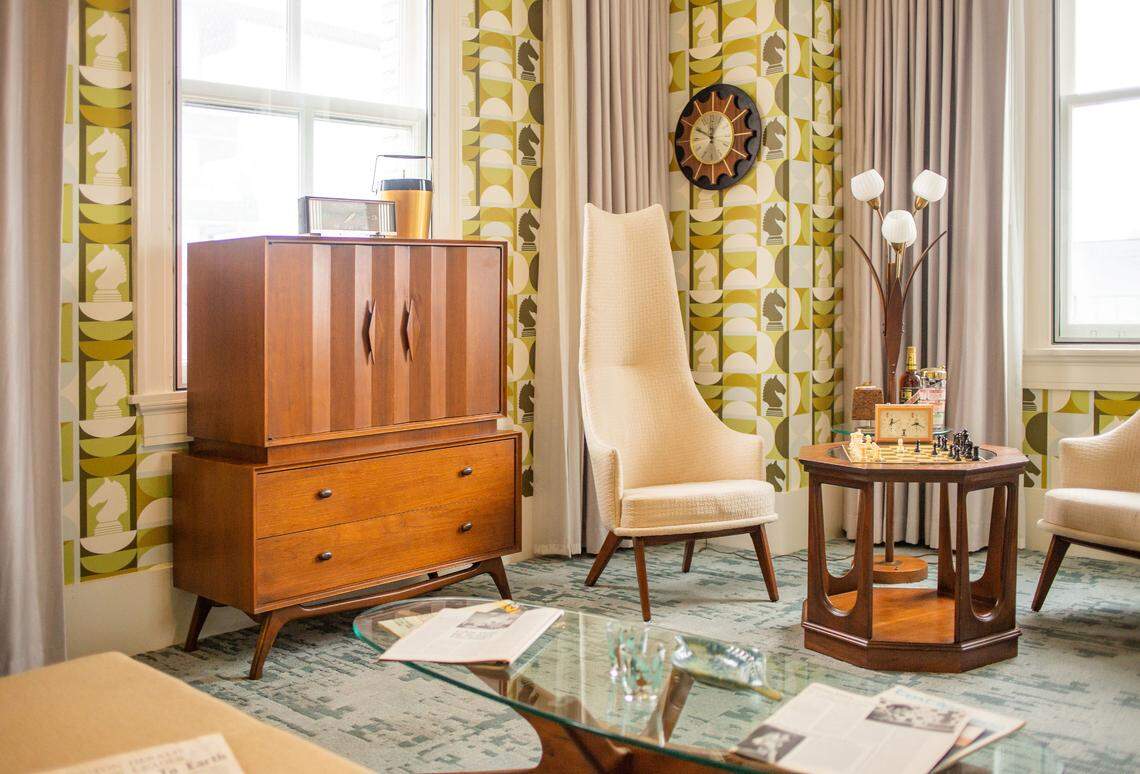 Preservationist and collector Lucy Jones loaned the hotel several pieces, including a Mid-Century Modern TV cabinet and a pair of vintage chairs.