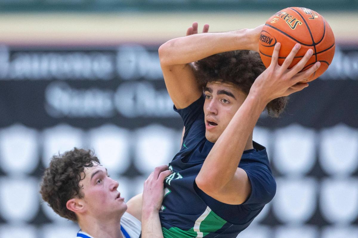 Great Crossing’s Malachi Moreno, right, was named a McDonald’s All-American selection Monday.