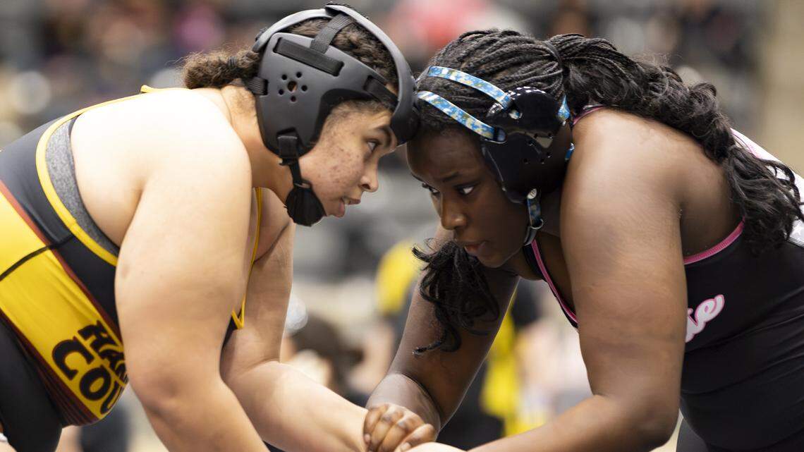 Harrison County’s Layla Davis locked up with Lafayette’s Elen Niyogoshima in the 235-pound finals of the 2026 KHSAA Girls State Wrestling Championships at the Kentucky Horse Park’s Alltech Arena on Saturday.