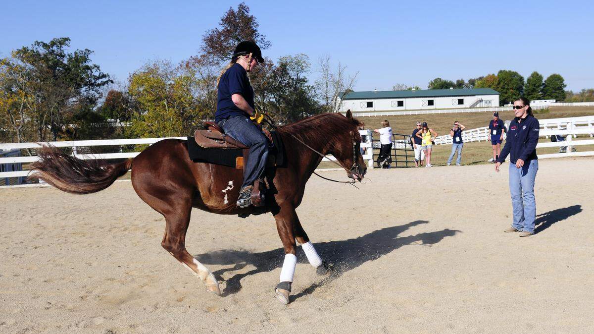 Anne Cecilie Ore, a para-dressage rider from Norway who is blind, realized her dream of riding a reining horse while she was in Kentucky competing in the World Equestrian Games. 
Ore got a lesson from Lyndsey Jordan, 22, a two-time world reining champion, and Blazin, a 10-year-old quarter horse, at Jordan's parents' farm near Georgetown.     