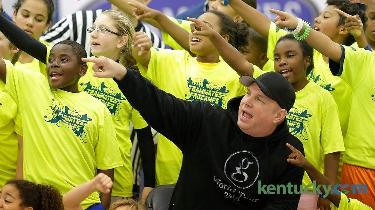 Garth Brooks posed with campers during a Teammates Procamp at Joe Craft Center in Lexington, Ky., on Nov. 1, 2014.  Photo by Pablo Alcala | Staff
