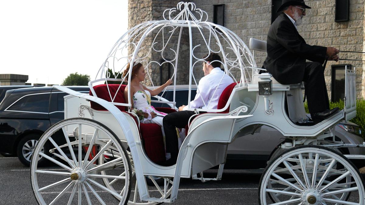 Michele, 17-year-old girl from Winchester with a nervous system disorder, arrived at the front of the Kentucky Castle in Versailles in a horse-drawn carriage for her own princess-themed ball hosted by Make a Wish, August 12, 2021.