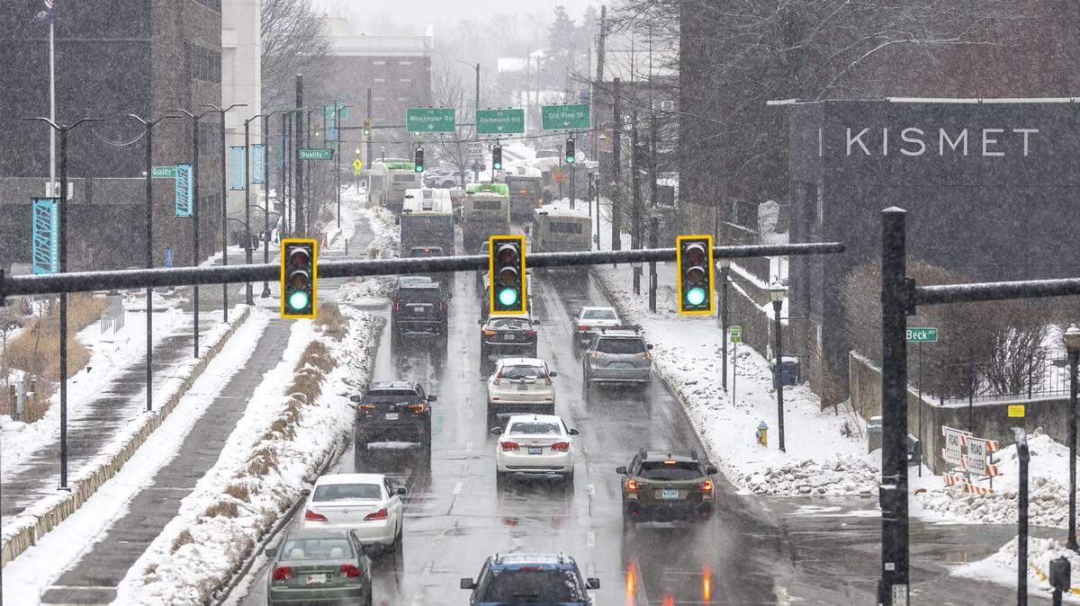 Vehicles drive along Vine Street in downtown Lexington, Ky., on Friday, Feb. 6, 2026.