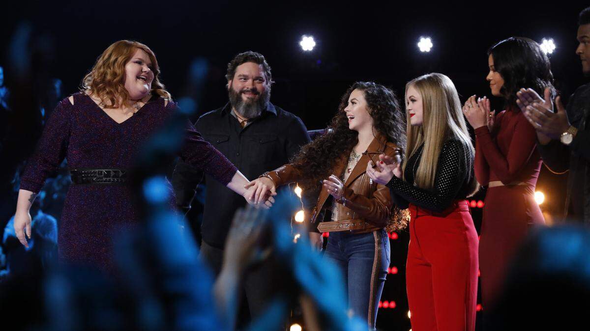 MaKenzie Thomas was congratulated by fellow competitors on “The Voice” Tuesday night after she made it into the top 10, including from left Dave Fenley, Chevel Shepherd, Sarah Grace and Lynnea Moorer.