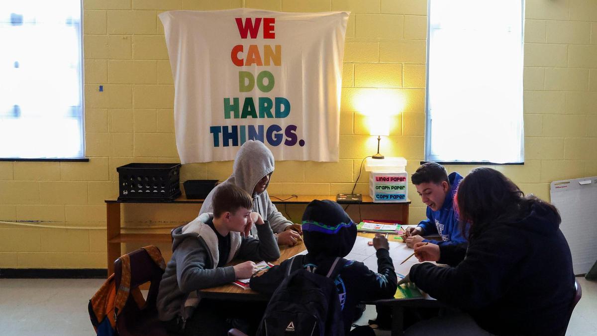 Lexington Traditional Magnet School students worked together plotting points on a graph to create art in a math class.