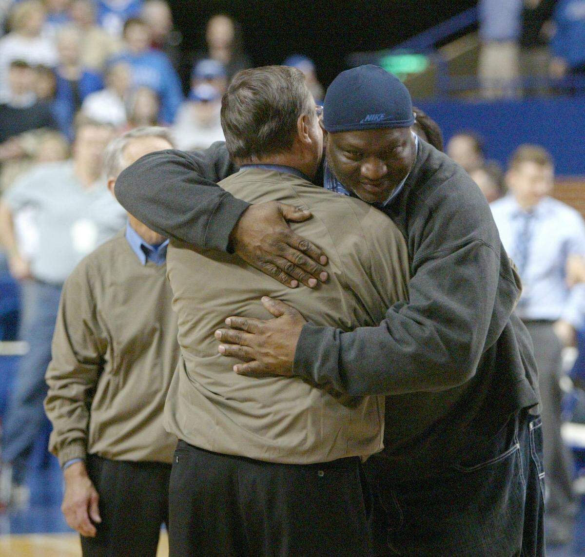 LaVon Williams hugged Joe B. Hall when Kentucky’s 1978 NCAA championship team was introduced in Rupp Arena in 2008.