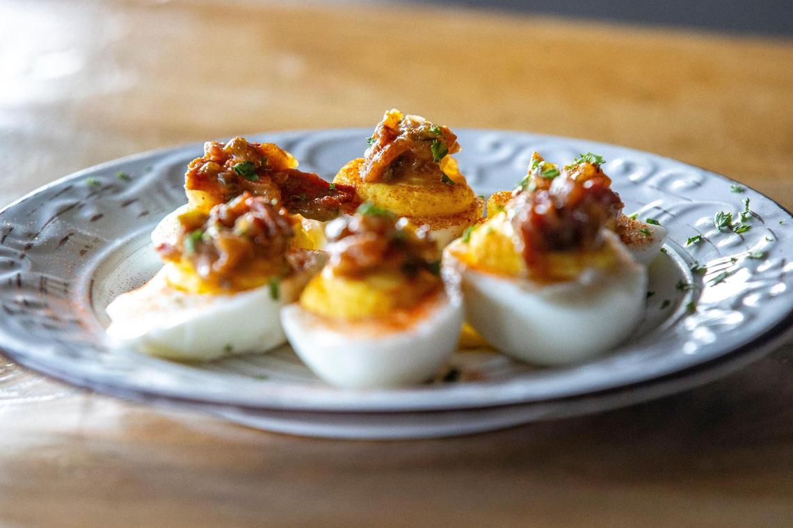 Deviled eggs, with bacon jalapeño jam, smoked paprika and gremolata, are on the menu at Yearling Kitchen inside Blue Stallion Brewing in Lexington.