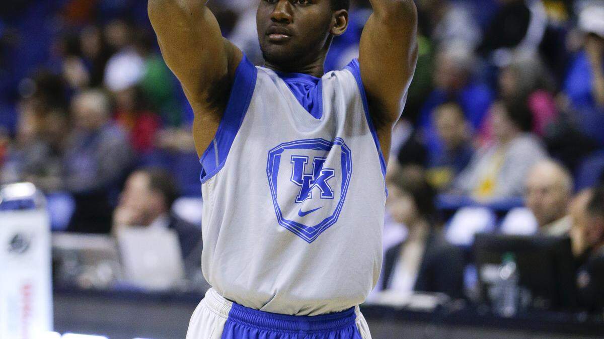 UK's Dominique Hawkins, put up a shot as Kentucky went through a public shoot around  in the Scottrade Center on Thursday March 20,  2014 in  Lexington Ky. Photo by Mark Cornelison | Staff