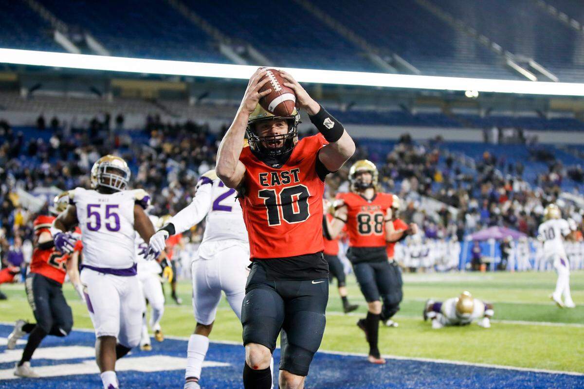 Bullitt East quarterback Travis Egan (10) ran into the end zone with the winning two-point conversion. On the trick play, Egan caught a pass from wide receiver Nolan Davenport in the final minute.