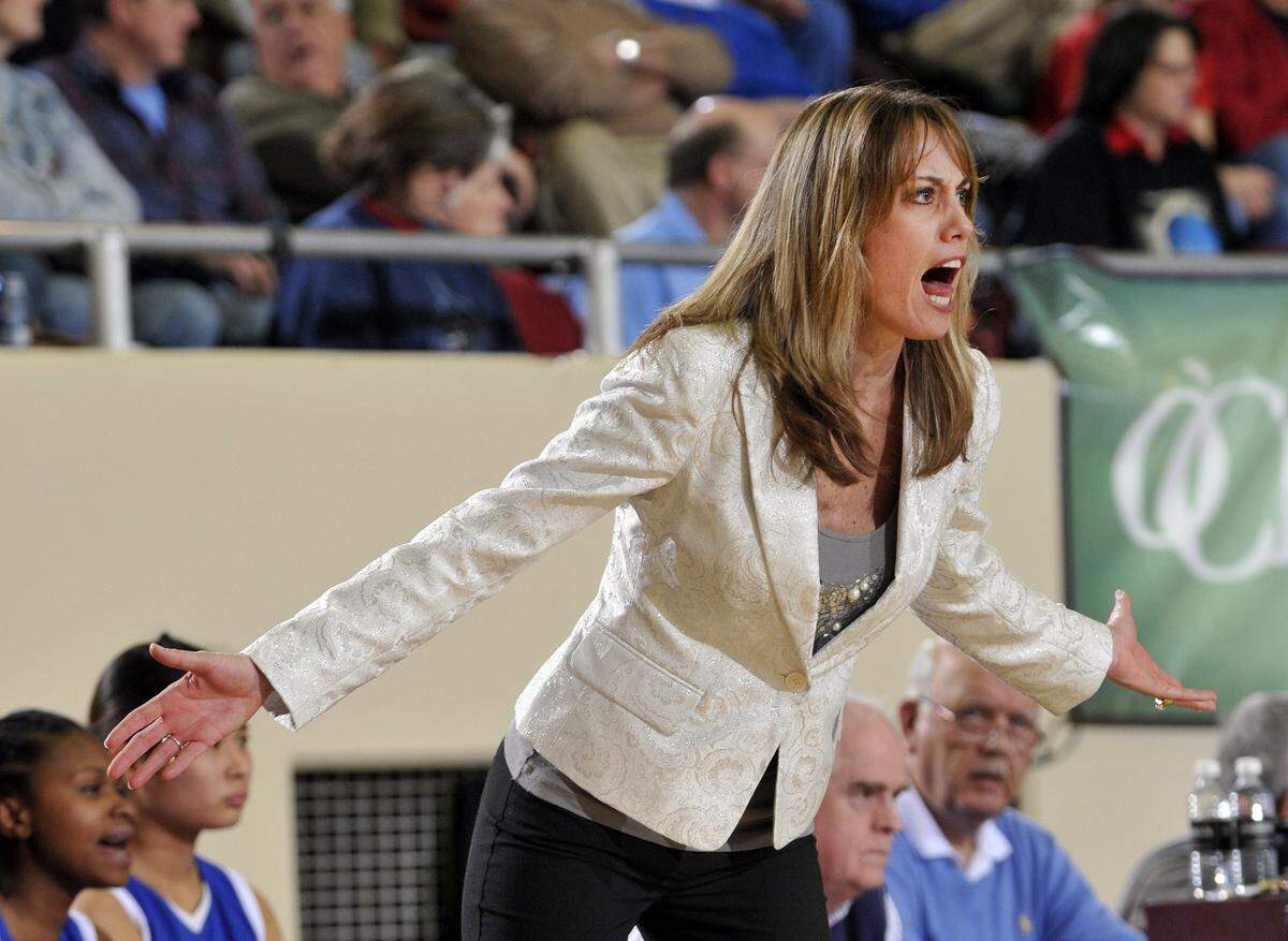 Lafayette coach Allison Tate Denton yells to her team against Madison Central, during the finals of the girls 11th Region Tournament in Richmond on March 5, 2013.