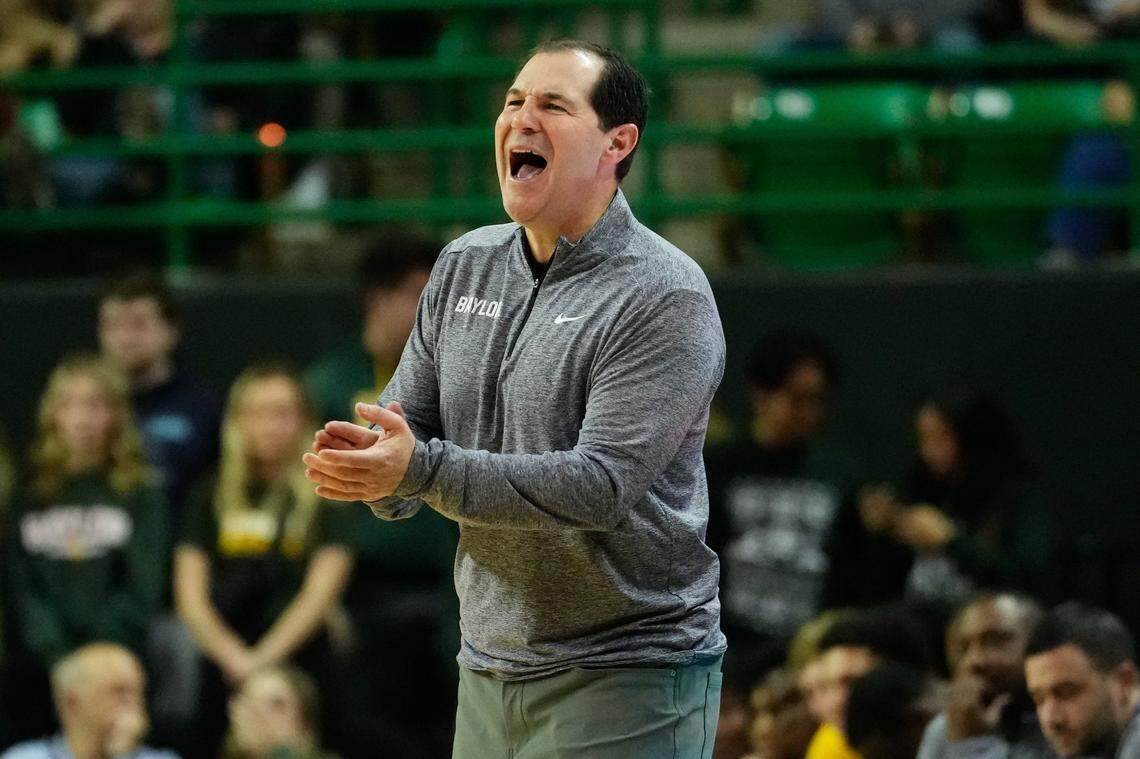 Dec 2, 2023; Waco, Texas, USA;  Baylor Bears head coach Scott Drew congratulates his team after a play against the Northwestern State Demons during the first half at Ferrell Center. Mandatory Credit: Chris Jones-USA TODAY Sports