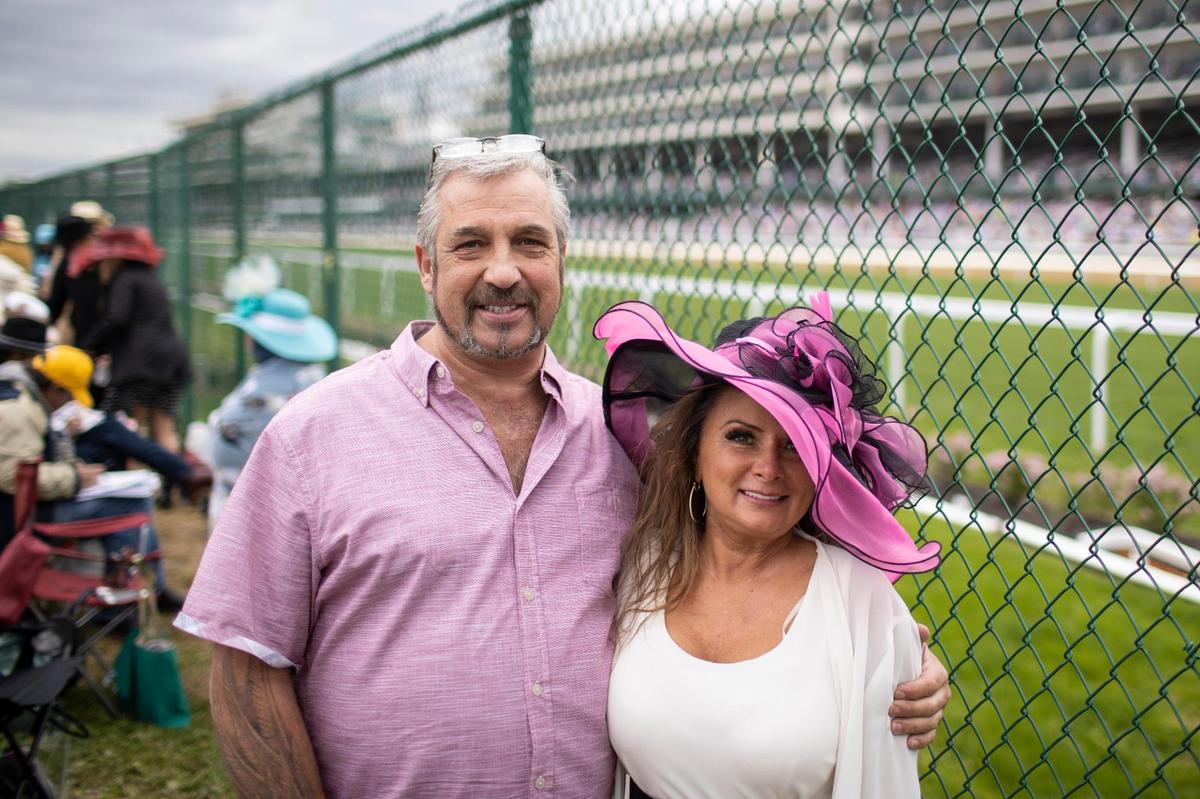 Bree Wilson and Joe Postusta drove from Minneapolis to attend their first derby at Churchill Downs in Louisville, Ky., Saturday, May 7, 2022.