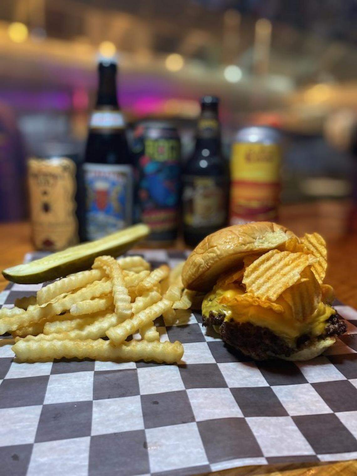 Jack Brown’s Burger Joint uses 100 percent American Wagyu beef in its burgers like the Greg Brady, topped with house-made mac and cheese, American cheese and Martin’s BBQ potato chips.