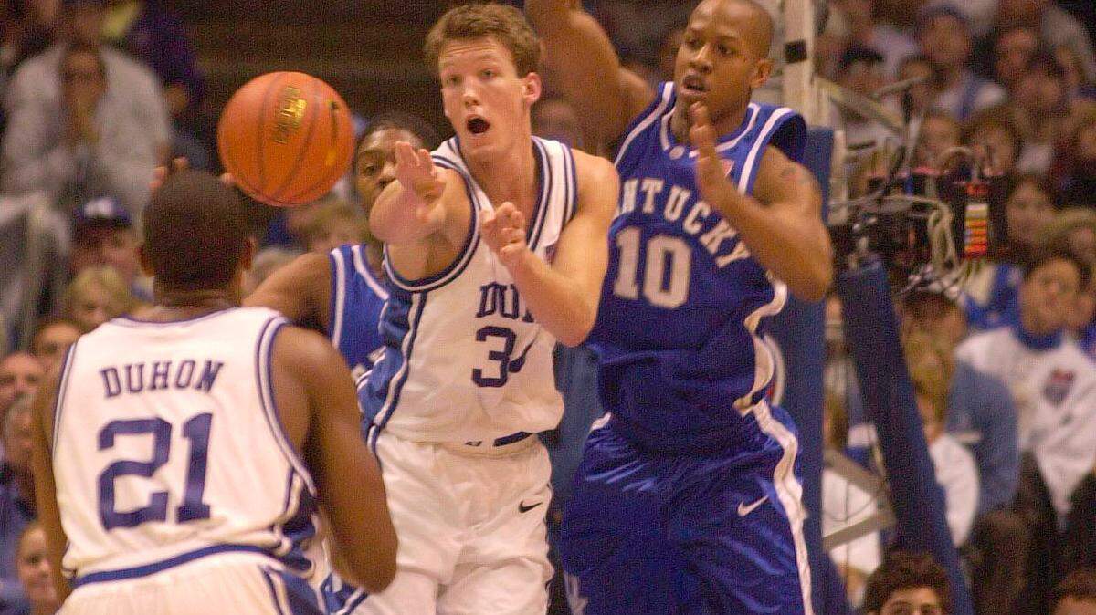 UK's Keith Bogans pressured Duke's Mike Dunleavy during the 2001 Jimmy V Classic at Meadowlands Sports Complex. Bogans is one of six ex-Cats to be inducted to the UK Athletics Hall of Fame in September.