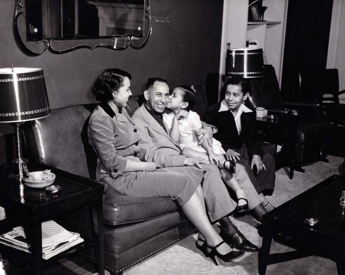 Alice Kean Houston, kissing her father, William Kean, sat on the Central High School bench while he coached the school’s boys’ basketball team until she was 9 years old. “Then he told me I was getting to be a big girl, and I could not longer sit on the bench or go near the locker room,” Alice Houston says.